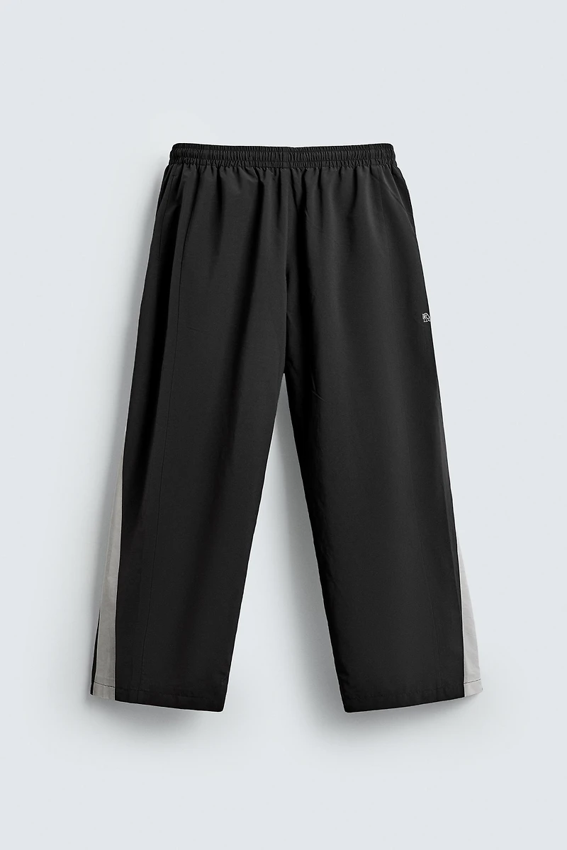 TECHNICAL PANTS WITH STRIPES