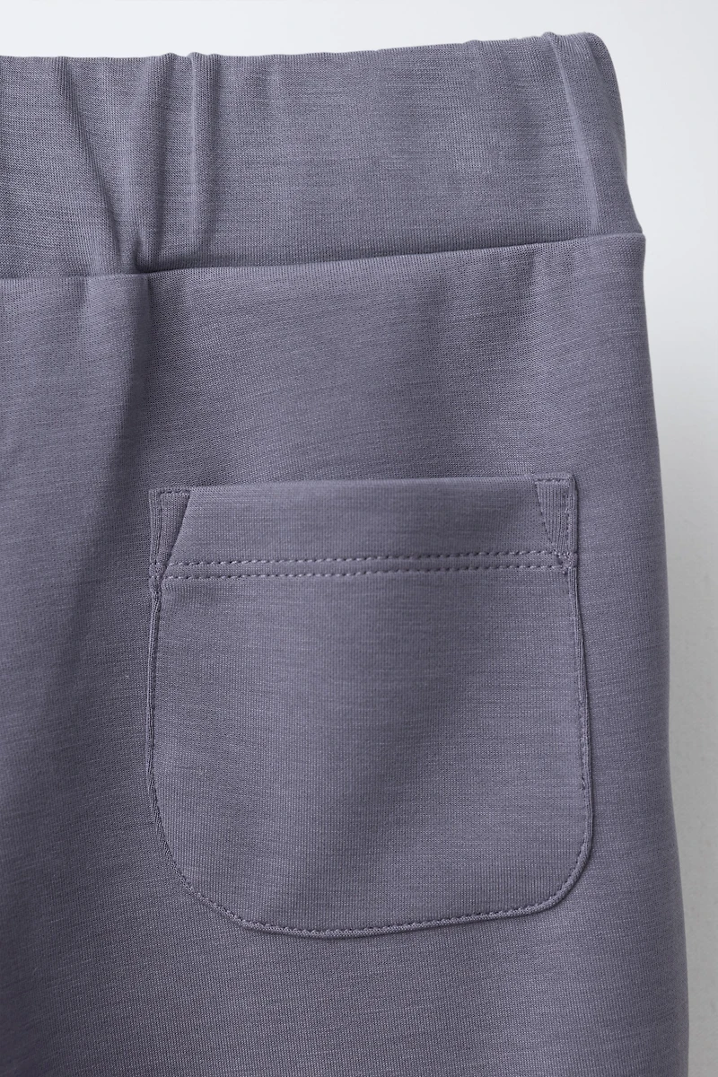 FLARE PANTS WITH CONTRAST STRIPES AND MODAL