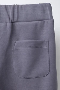 FLARE PANTS WITH CONTRAST STRIPES AND MODAL