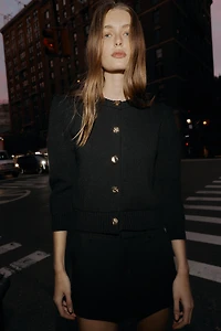 GILET EN MAILLE À ÉPAULES MARQUÉES