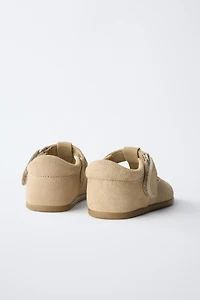 CHAUSSURES EN CUIR