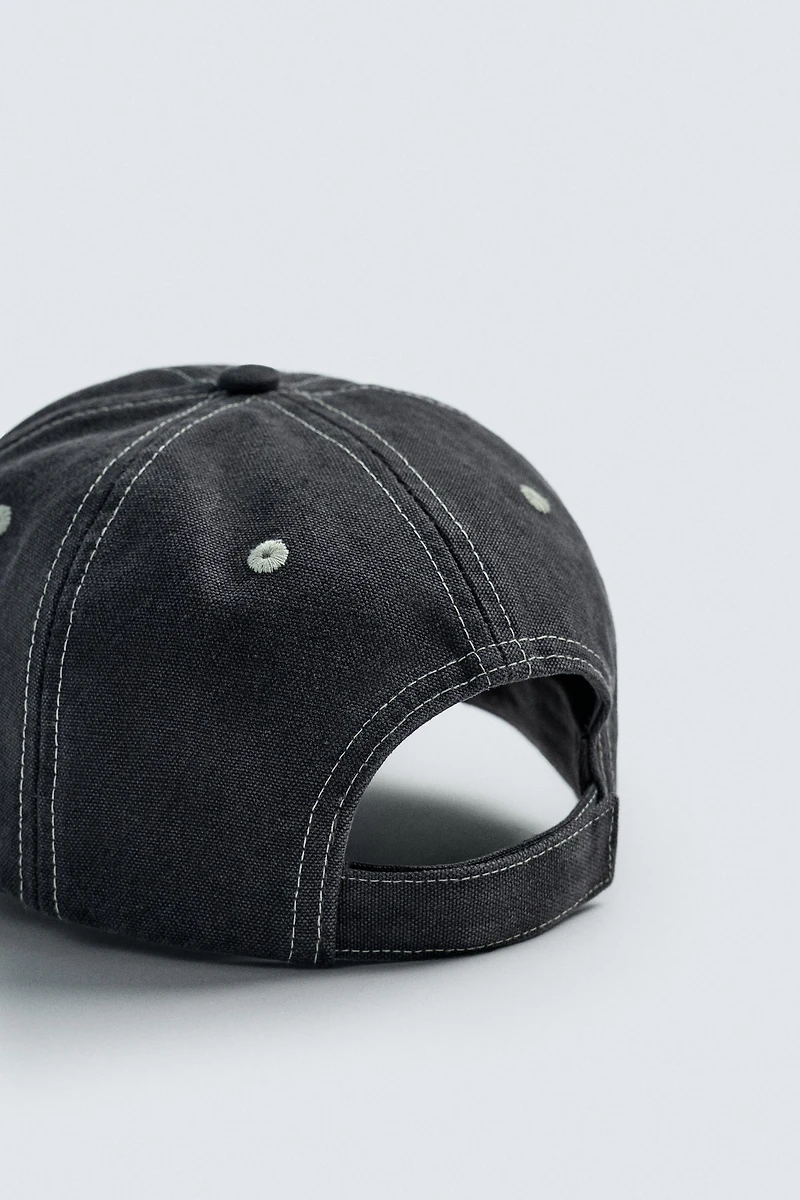 WASHED EMBROIDERED TEXT TOPSTITCHED CAP