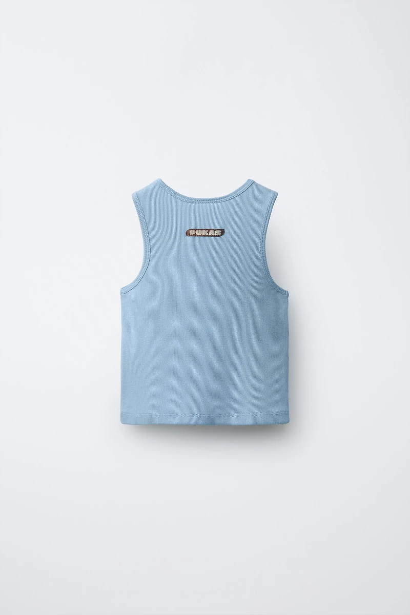 TOP UNI PUKAS SURF