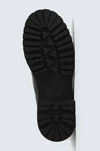 BOTTES À LACETS EN CUIR