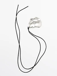 Pendentif pièce abstraite