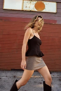 STRETCH PEPLUM TOP