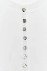 TOP À BOUTONS