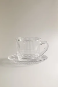 COFFEE CUP AND SAUCER WITH RAISED GEOMETRIC DESIGN