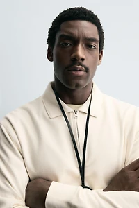 TEXTURED ZIP POLO SHIRT