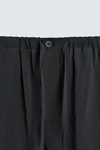 RELAXED FIT FLOWY PANTS