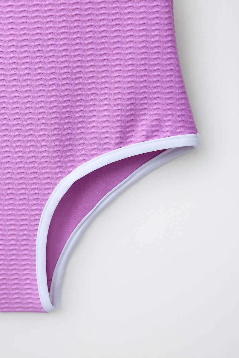 6-14 YEARS/ TEXTURED SWIMSUIT WITH CONTRASTING PIPING