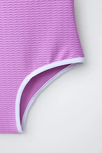 6-14 YEARS/ TEXTURED SWIMSUIT WITH CONTRASTING PIPING