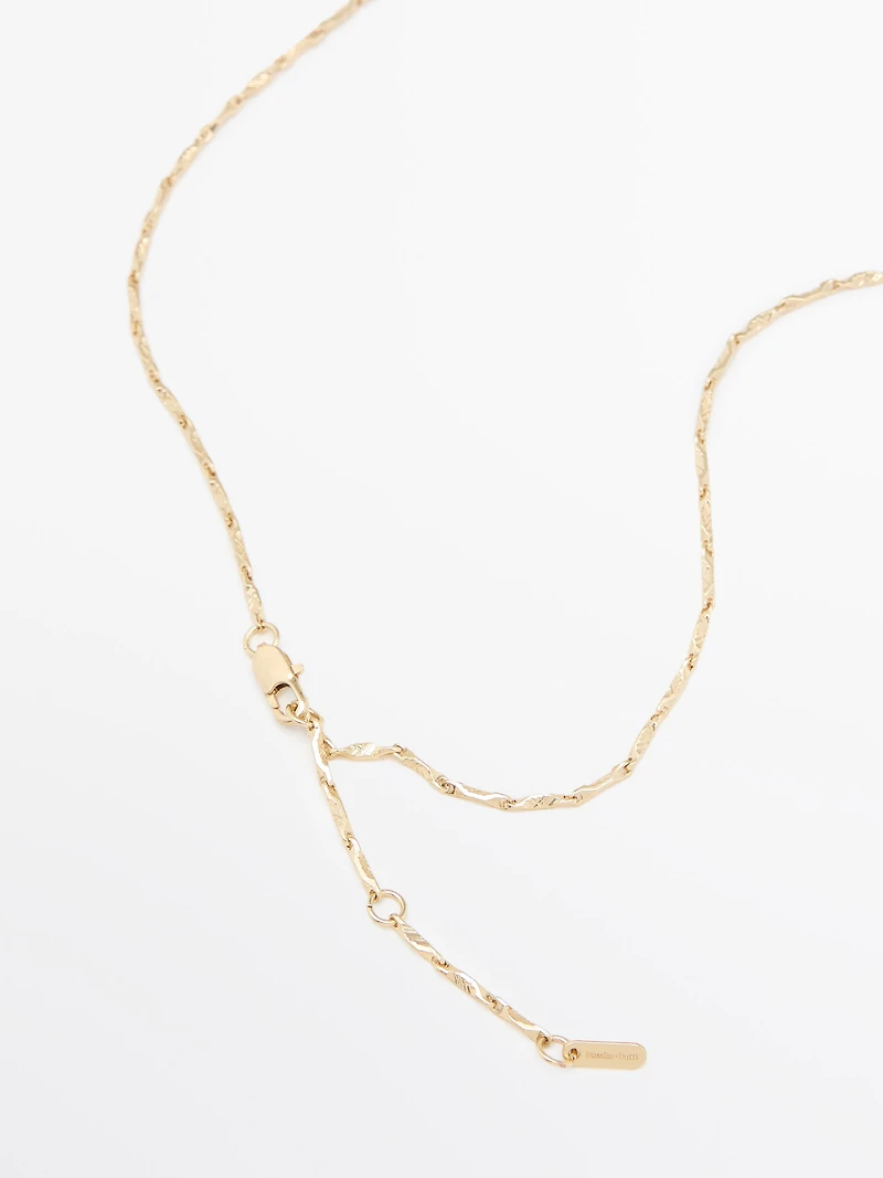 Pendant necklace with metal signet piece