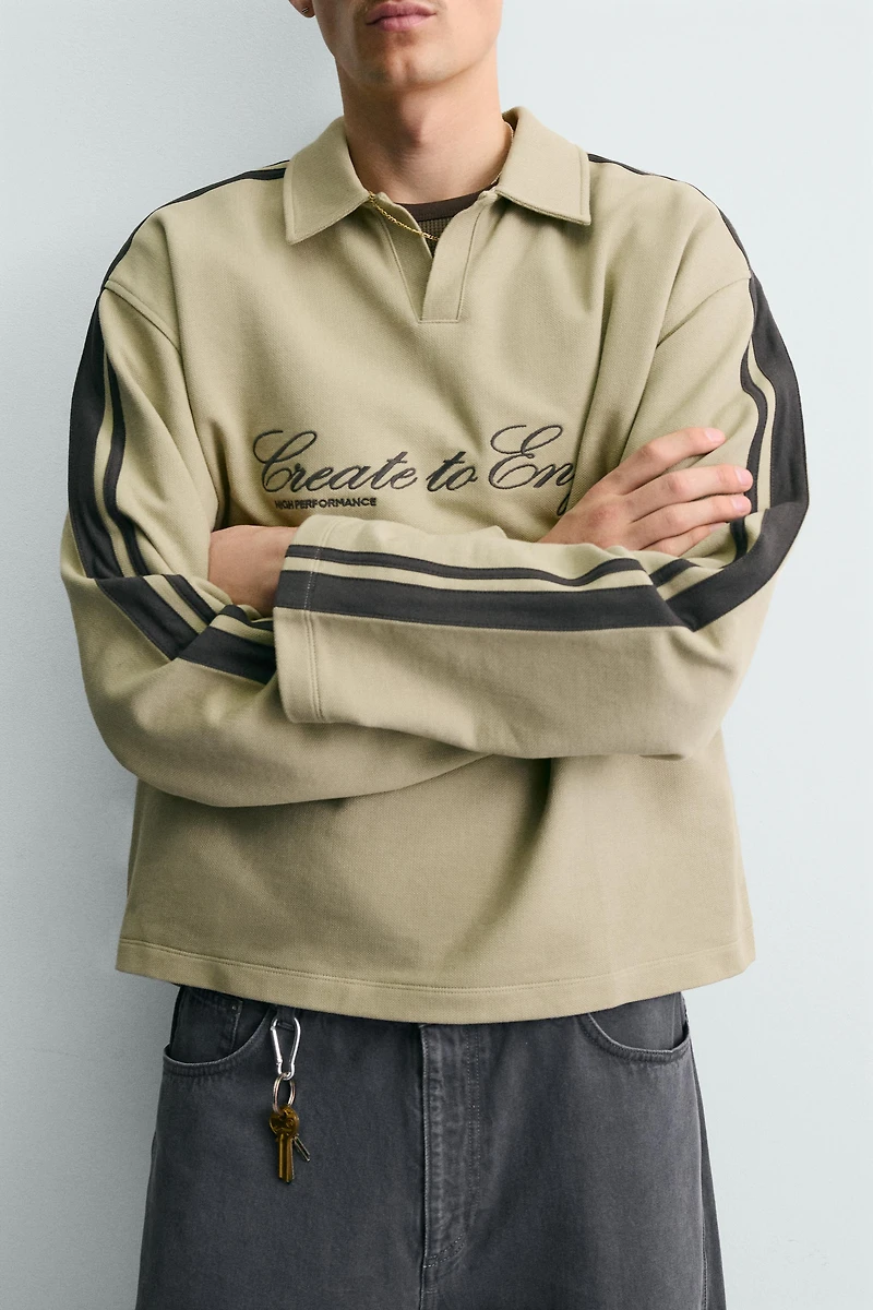 BOXY FIT EMBROIDERED STRIPED SWEATSHIRT