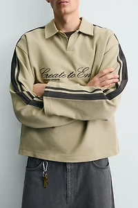 BOXY FIT EMBROIDERED STRIPED SWEATSHIRT