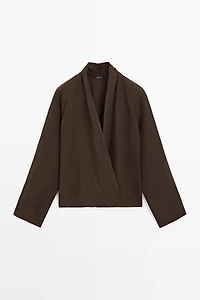 Flowing loose-fitting linen wrap blouse