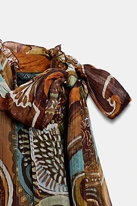 TOP ASYMÉTRIQUE IMPRIMÉ AVEC FIL MÉTALLISÉ