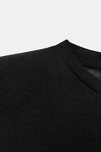 FLUID SLEEVELESS SHOULDER PAD T-SHIRT