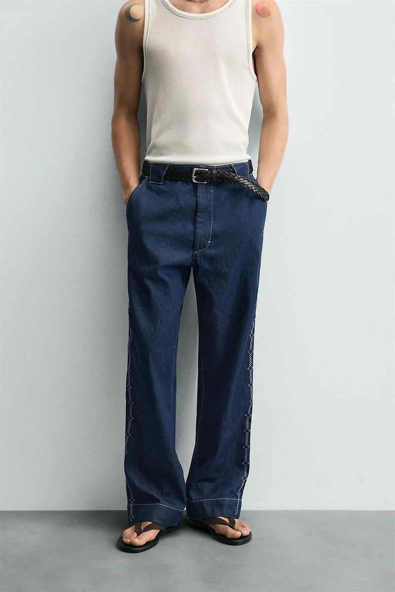 EMBROIDERED BAND DETAIL JEANS