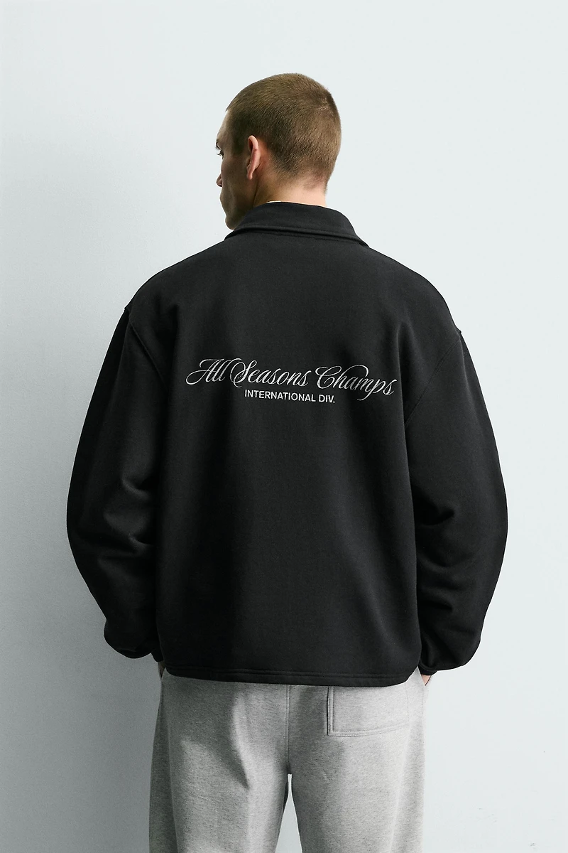 TEXT PRINT QUARTER-ZIP SWEATSHIRT
