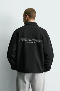 TEXT PRINT QUARTER-ZIP SWEATSHIRT