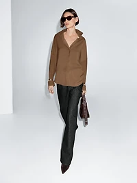 Flowing shirt with hidden buttons