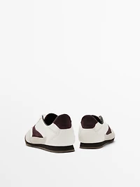 Tennis cuir contrastant