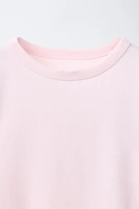 MODAL T-SHIRT WITH CUT OUTS AND BOWS
