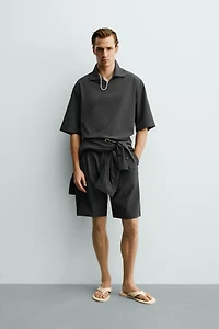 IRREGULAR TEXTURE PLEATED SHORTS