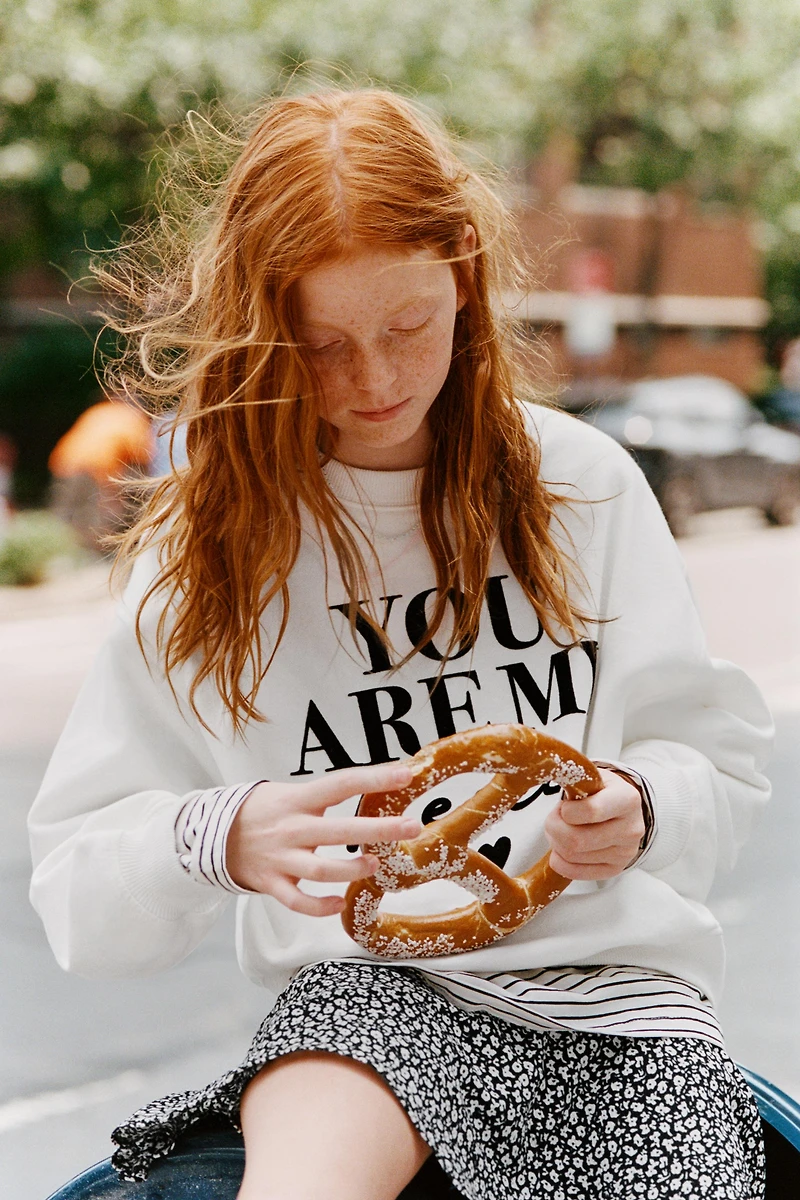 FLOCKED TEXT SWEATSHIRT