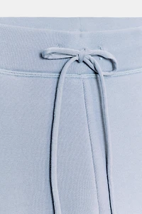 WASHED EFFECT FLARE PANTS