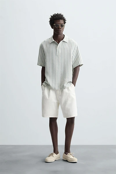 CHEMISE POLO STRUCTURÉE À CHEVRONS