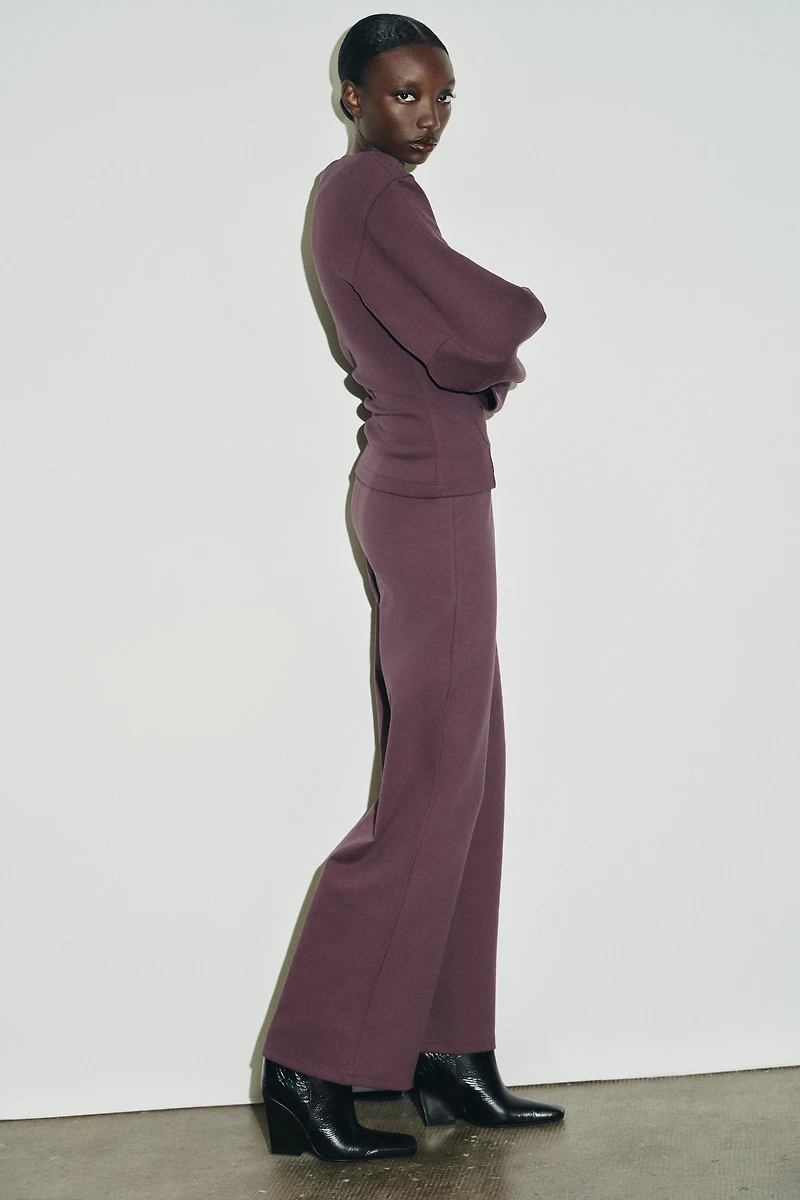 INTERLOCK JUMPER WITH DARTS