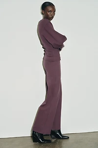 INTERLOCK JUMPER WITH DARTS