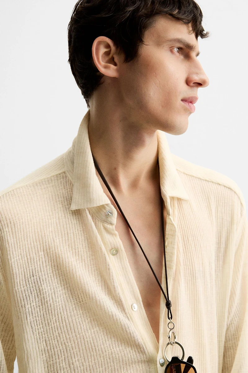 CHEMISE STRUCTURÉE SEMI-TRANSPARENTE