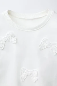 CROCHET BOW T-SHIRT