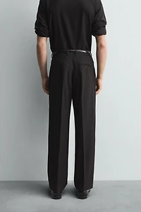 LIMITED EDITION PLEATED WOOL PANTS
