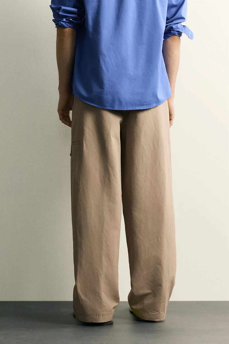RELAXED FIT PLEATED PANTS