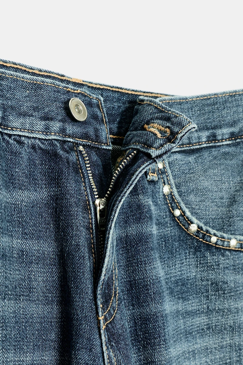 TRF SLUNG LOW-RISE STUDDED JEANS