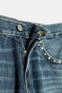 TRF SLUNG LOW-RISE STUDDED JEANS