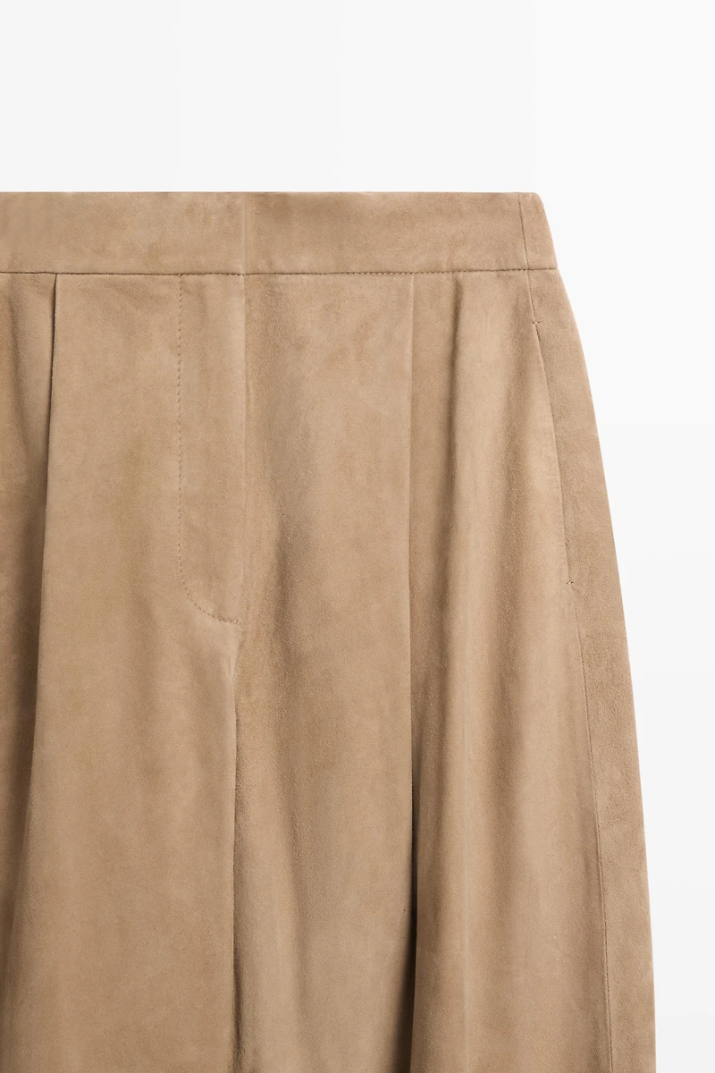 Suede leather pants with tie-detail hems