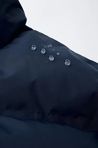 MANTEAU MATELASSÉ ÉTIQUETTE WATER REPELLENT