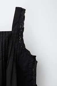 EMBROIDERED SMOCKED TOP