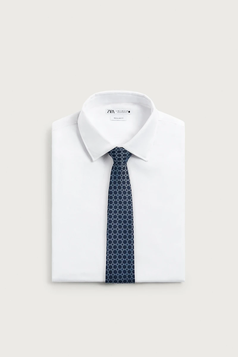 CRAVATE 100% SOIE JACQUARD GÉOMÉTRIQUE