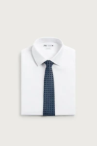 CRAVATE 100% SOIE JACQUARD GÉOMÉTRIQUE