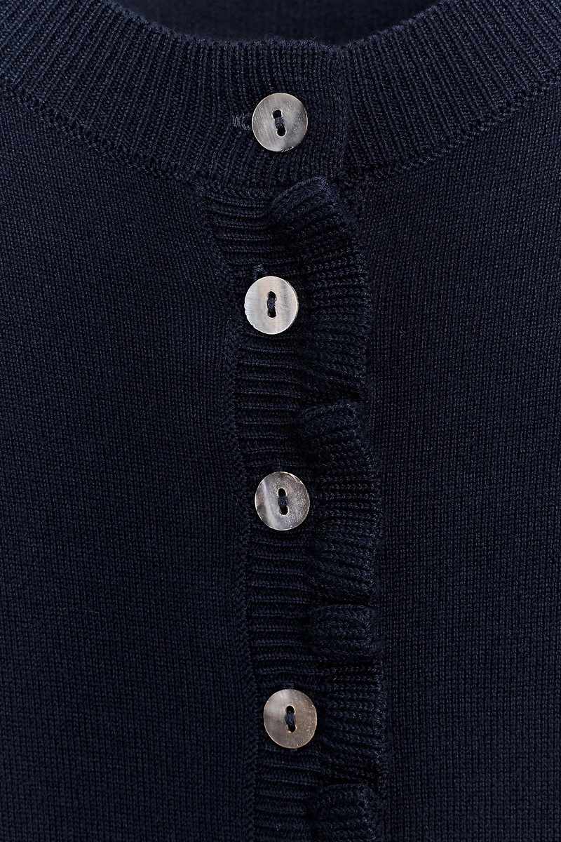 RUFFLED KNIT CARDIGAN