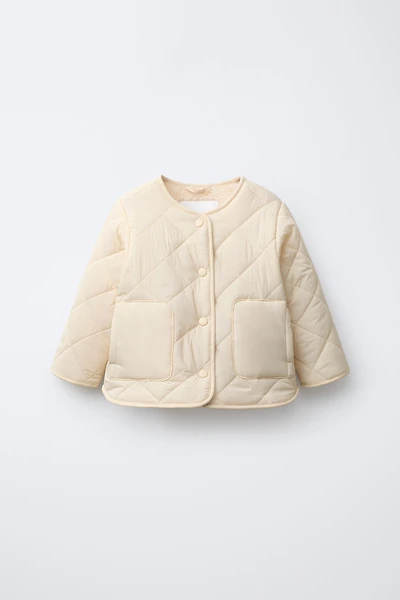 WATER REPELLENT NYLON FAUX SHEARLING JACKET