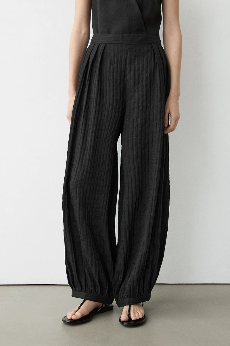 Flowing linen-blend drop crotch pants