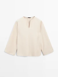Flowing blouse with slit details