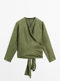 Flowing linen blouse with tie detail at the waist